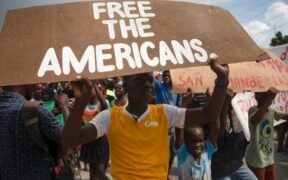 photo shows Haitians protesting kidnapping of missionaries
